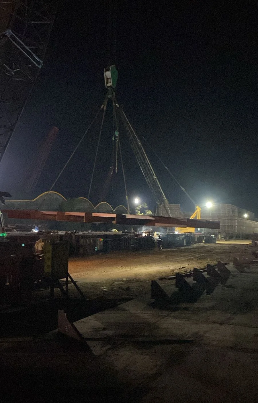 Crane lifting work at night